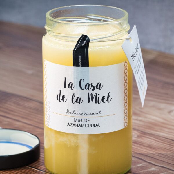 Miel de Azahar cruda destapada y la tapa justo al lado